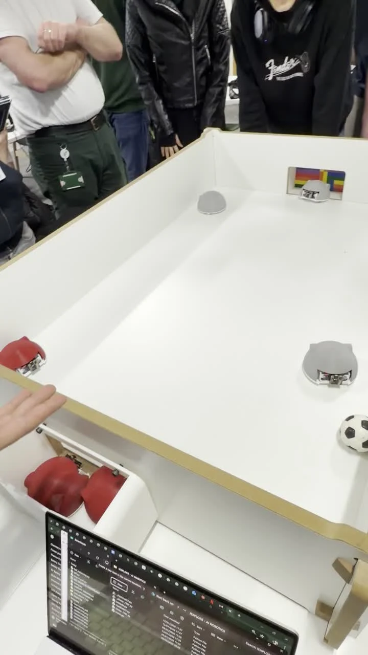 Frame from the supplied red-team match, with the red robots near the goal