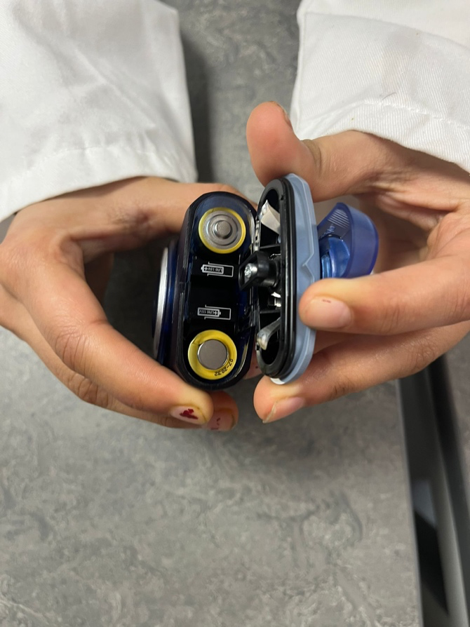 Battery and transmission access